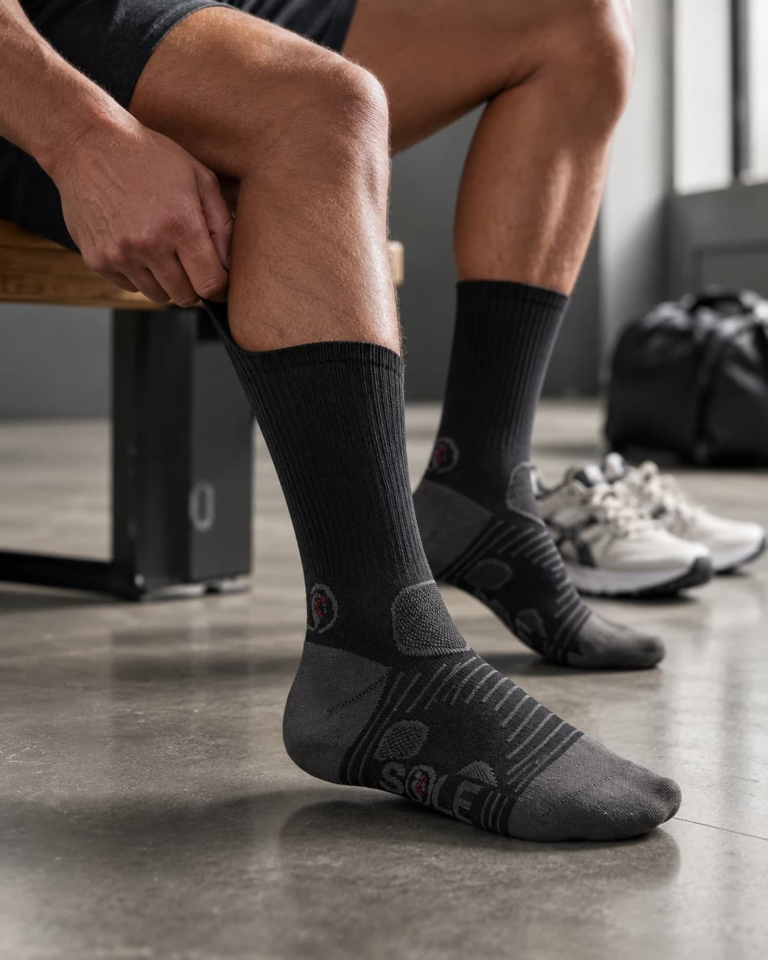 Black Soleimpact crew performance socks worn in a gym