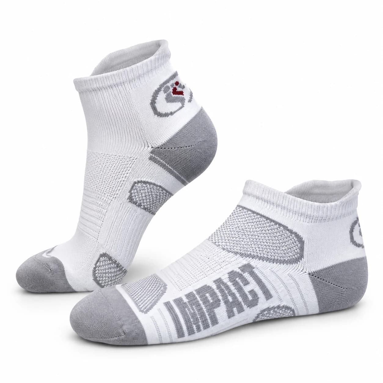 Pair of white Soleimpact low-cut performance socks on a white background
